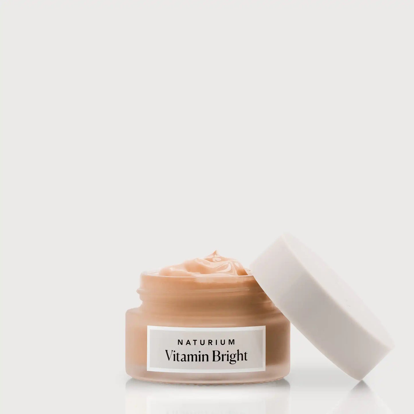vitamin-bright-illuminating-eye-cream-z6 NATR-VitaminBright_DEEP_Primary_front_openjar_bone.webp