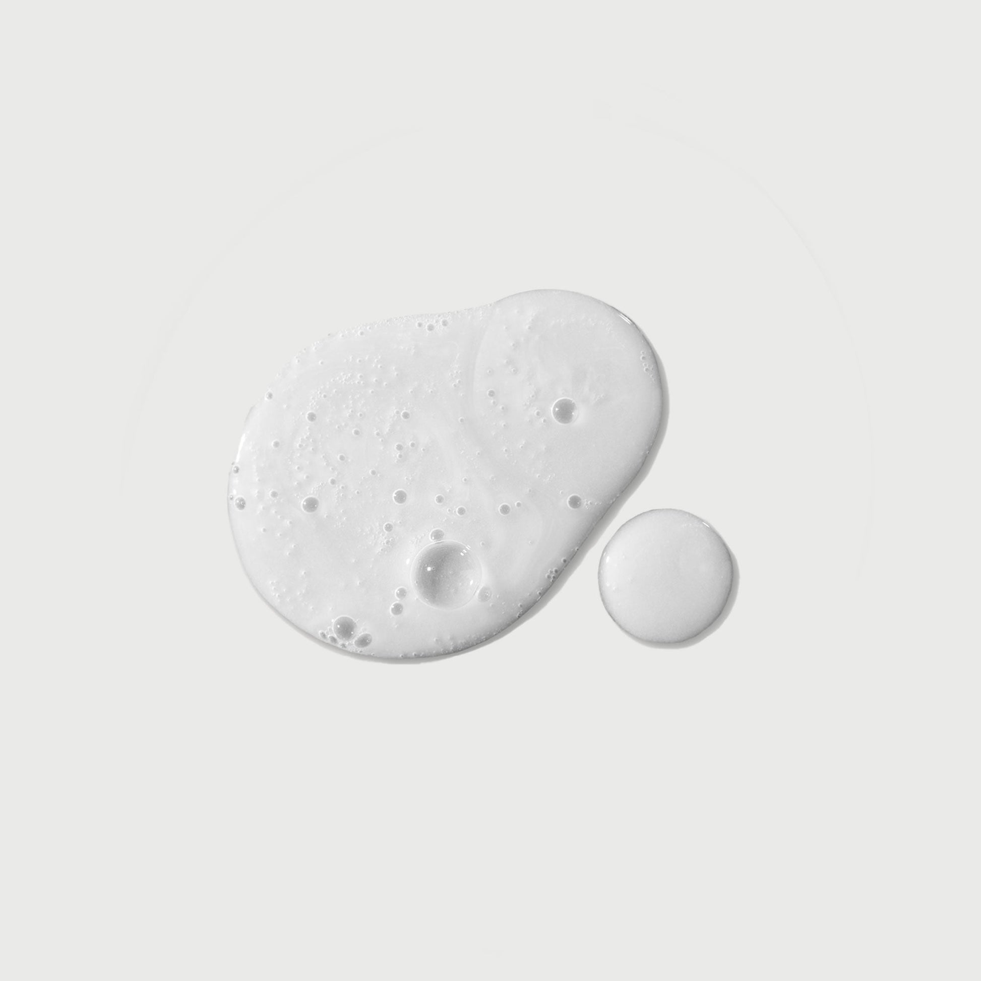 the-purifier-niacinamide-serum-body-wash-i3 NATR-40012-Swatch-The-Purifier-Niacinamide-Serum-Body-Wash-bonebkgd.jpg