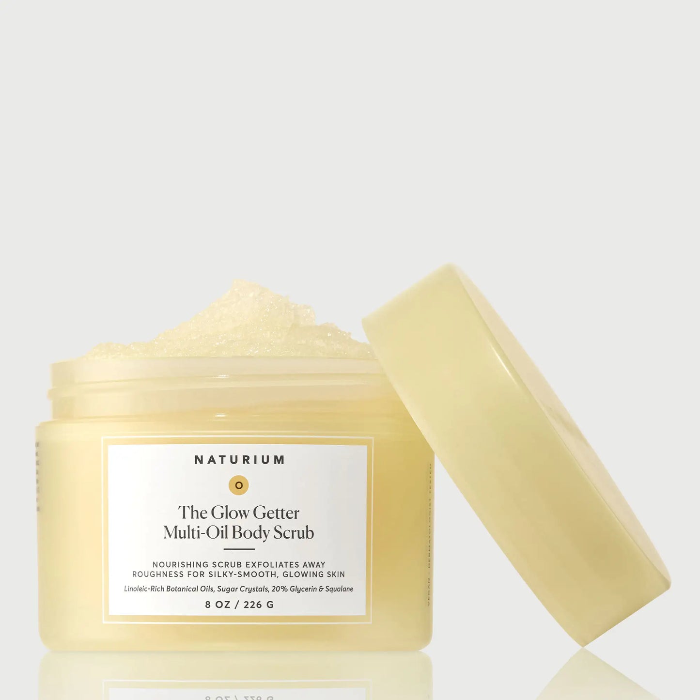 the-glow-getter-multi-oil-body-scrub-u2 NATR-40028-GlowGetter-Multi-Oil-Body-Scrub-Front-CapOff-bonebkgd.webp