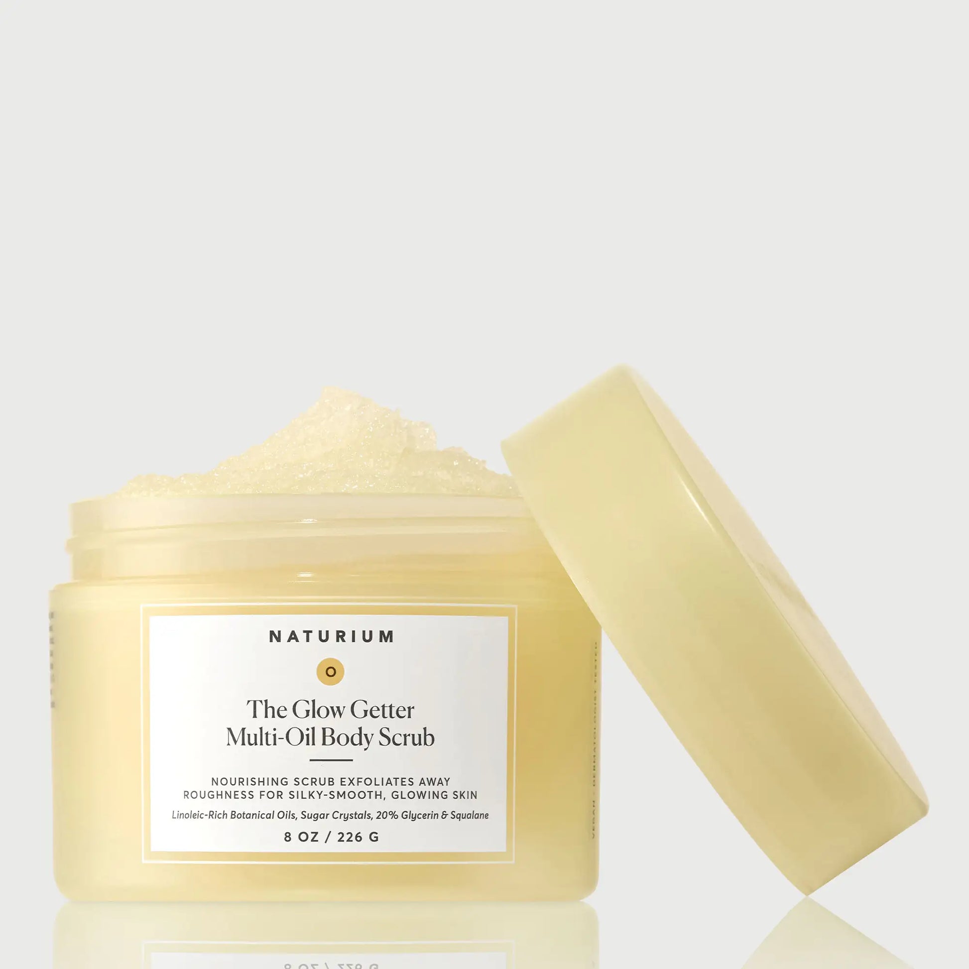 the-glow-getter-multi-oil-body-scrub-u2 NATR-40028-GlowGetter-Multi-Oil-Body-Scrub-Front-CapOff-bonebkgd.webp
