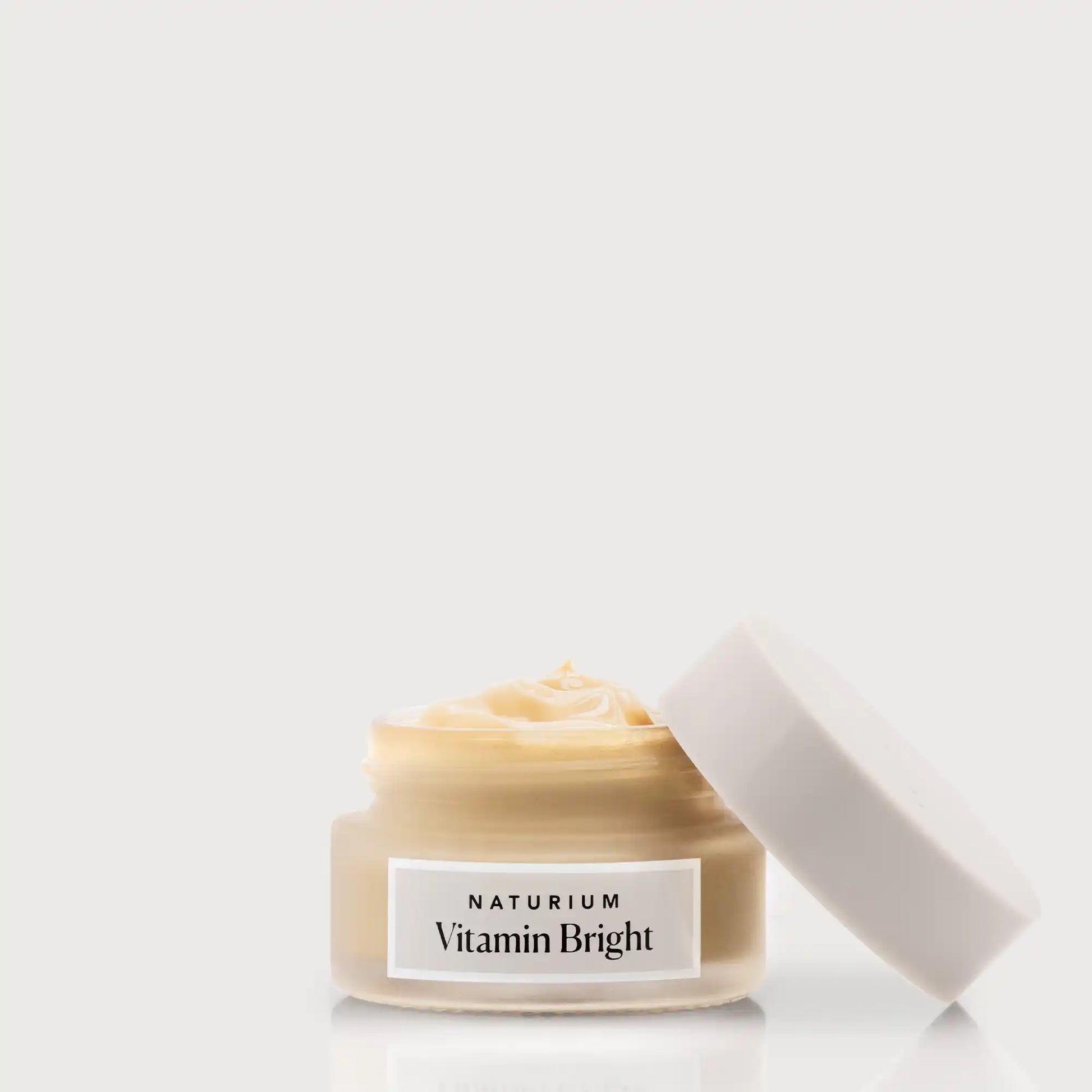 vitamin-bright-illuminating-eye-cream-z6 NATR-VitaminBright_LIGHT_Primary_front_openjar_bone.webp