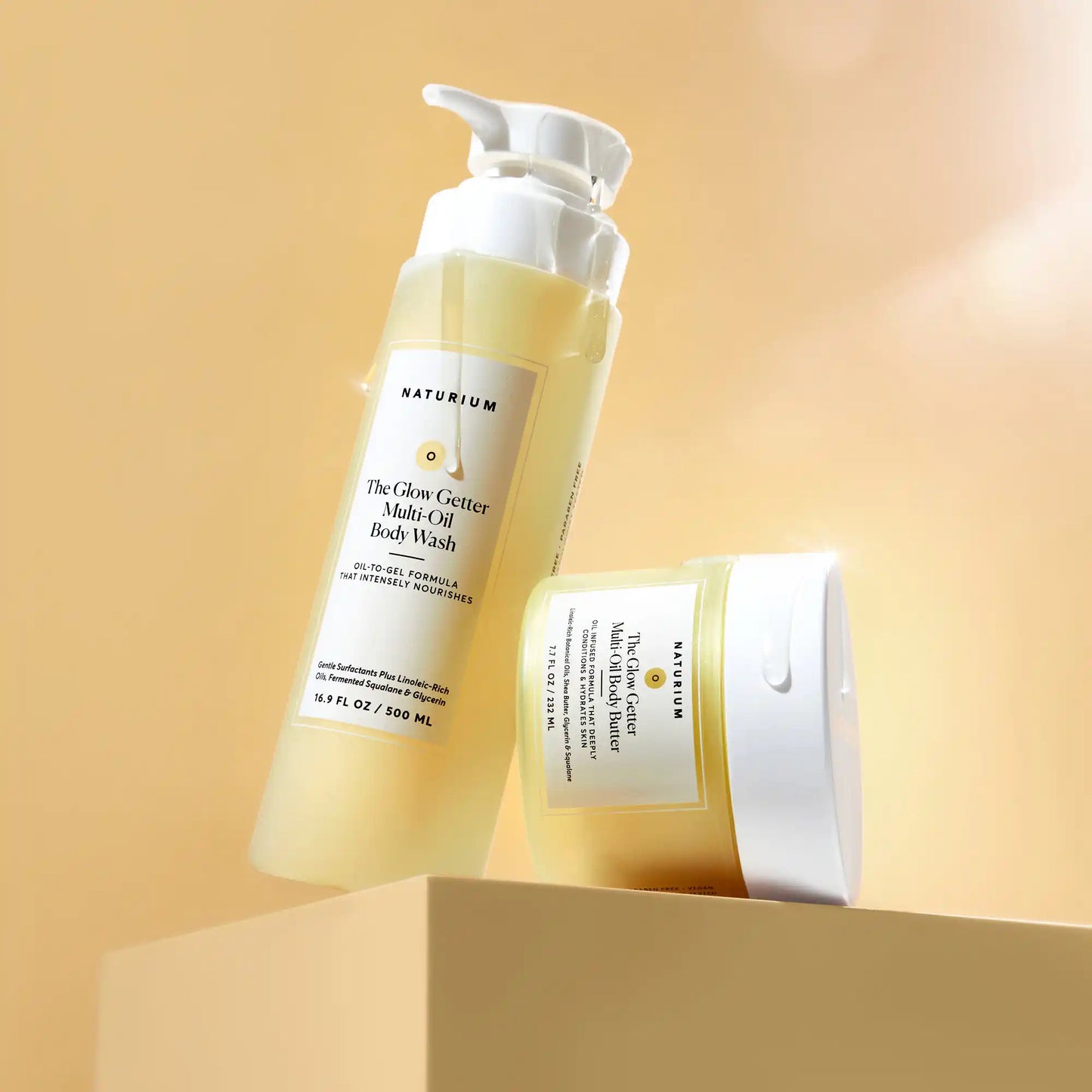 the-glow-all-out-body-bundle-q1 gg-bodybutter_1464-crop_revcolor_FL.webp